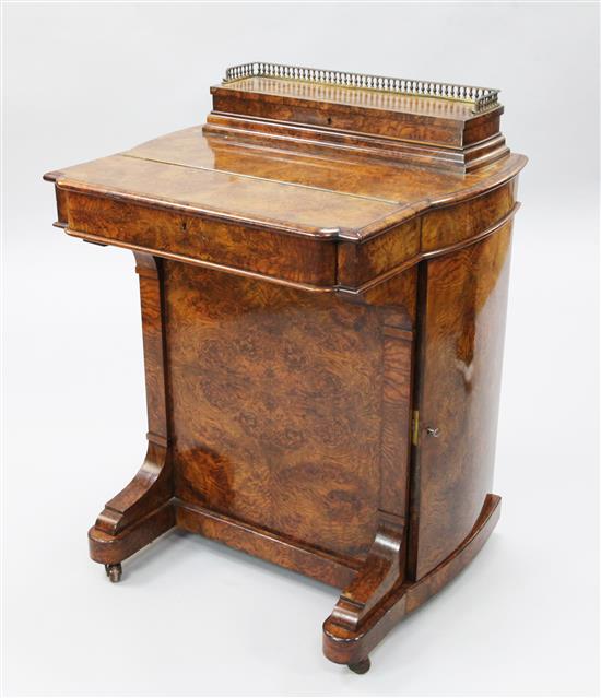 A Victorian burr walnut Davenport, W.2ft 1in. D.1ft 10in. H.2ft 9in.